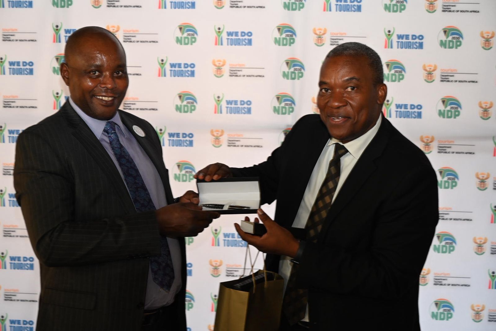 Director General of South Africa Department of Tourism Mr.Nkhumeleni Victor Vele, Director General of the South African Presenting Gift to Tourism Secretary David Gitonga Department of TourismNkhumeleni Victor Vele, Director General of the South African Department of Tourism to