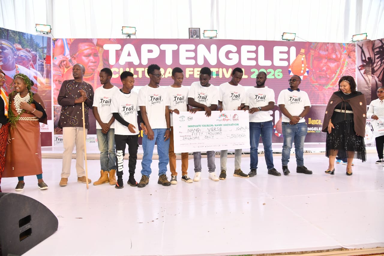 winners being presented with a cash prize